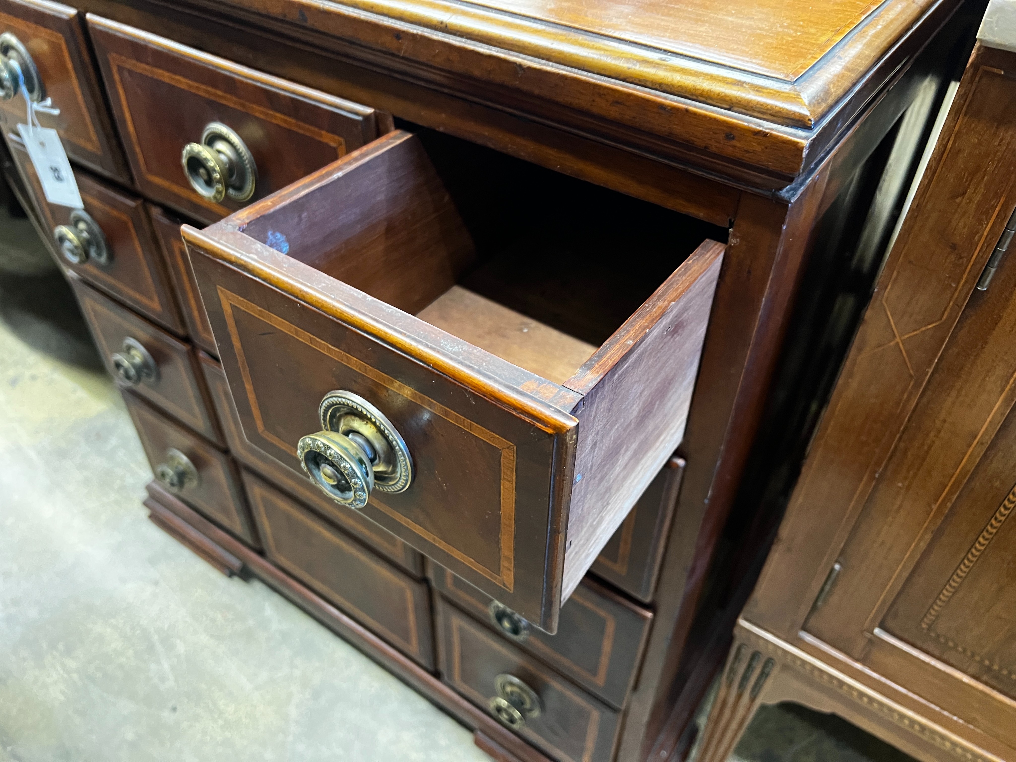 A small George III style satinwood banded mahogany six drawer chest, width 73cm, depth 47cm, height 80cm